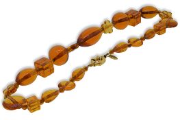 An amber bead necklace,