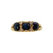 An 18ct gold sapphire and diamond ring,