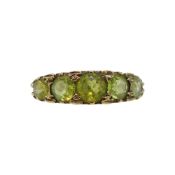 A five stone peridot ring,