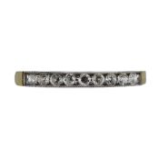 An 18ct gold diamond set half hoop ring,