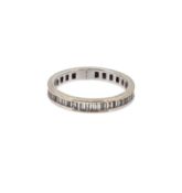 A modern 18ct gold full eternity ring,