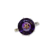 An amethyst and diamond dress ring,