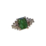 An emerald and diamond ring,