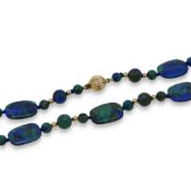 A lapis with malachite bead necklace, together with a pair of ear studs,