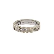 An 18ct gold diamond set band,
