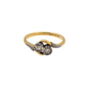 A two stone diamond crossover ring,