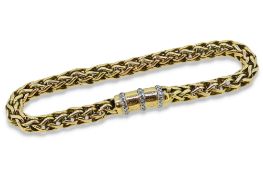 A fancy bracelet with a diamond set clasp,