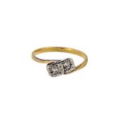 An early 20th century two stone diamond crossover ring,