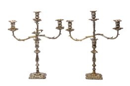 A PAIR OF SPANISH SILVER PLATED CANDELABRA BY F. VALENTI