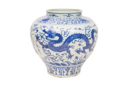 A LARGE CHINESE BLUE AND WHITE 'DRAGON' VASE