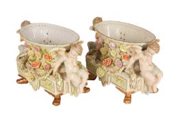 A PAIR OF MID 20TH CENTURY DRESDEN PORCELAIN CENTRE PIECES