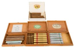 FOUR BOXES OF TUBED AND LOOSE CIGARS