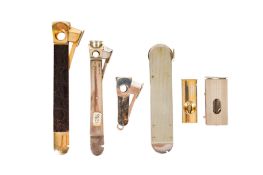 A GROUP OF CIGAR CUTTERS