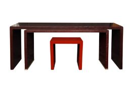A SET OF THREE NESTING LACQUER CONSOLE TABLES
