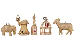 A GROUP OF FIVE CHARMS