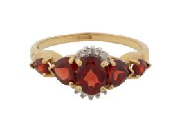 A GARNET AND DIAMOND RING