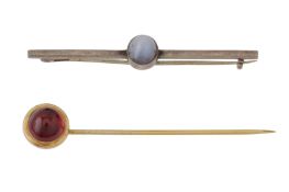 A PIN AND A BROOCH