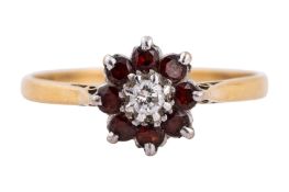 A GARNET AND DIAMOND RING
