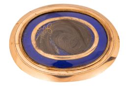 A hair locket memorial brooch