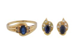 A sapphire ring and earrings suite