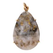 A white labradorite pendant, circa 1979