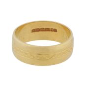 An 18ct yellow gold band, circa 1973