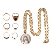 Six rings and a pendant necklace