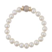 A pearl and diamond bracelet