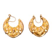 A pair of flower hoop earrings