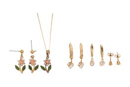 Four pairs of earrings and a pendant necklace