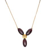 A garnet and diamond pendant necklace