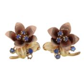 A pair of sapphire flower earrings