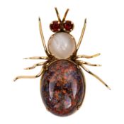 A gem set spider brooch