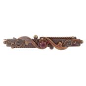 A ruby rectangular brooch