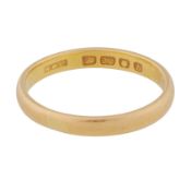 A 22ct yellow gold band, circa 1957