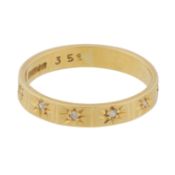 A diamond half eternity ring