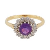 An amethyst and diamond ring