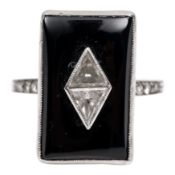 An onyx and diamond ring