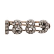 An 1889 diamond brooch