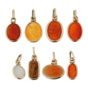 A collection of intaglio charms pendants