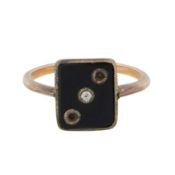 An onyx and sapphire ring