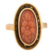 A carved coral ring