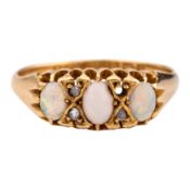 An opal and diamond three stone ring