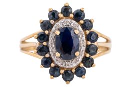A sapphire and diamond halo ring