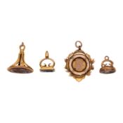 Three fob seals and a pendant