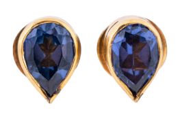 A pair of sapphire stud earrings