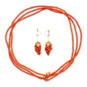 A coral necklace and earrings suite