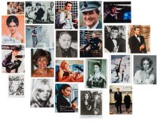 James Bond Interest.- Large selection of photographs signed by cast members of the James Bond movies