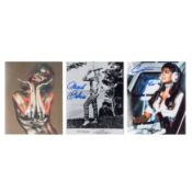 James Bond Interest.- Bond Girls Three photographs signed by Ursula Andress, Shirley Eaton and Carol