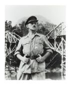 Guinness (Alec) Signed glossy black and white photograph of Alec Guinness as Lieutenant Colonel Nich